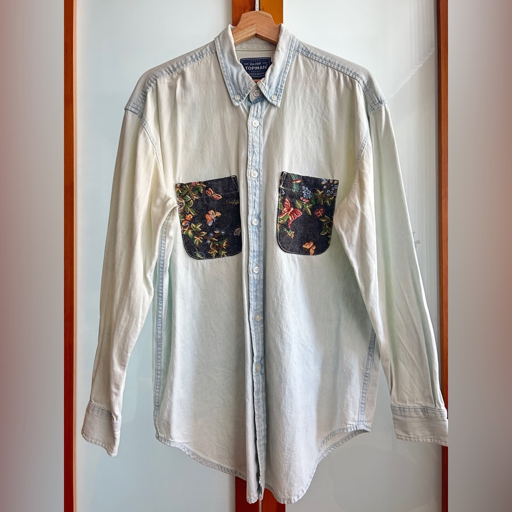 Oversized denim shirt with vintage pocket detailing